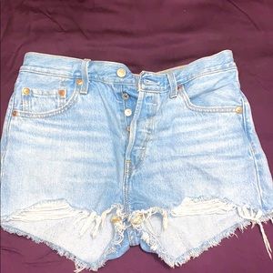 Levi’s High Waisted 501 shorts in light wash.